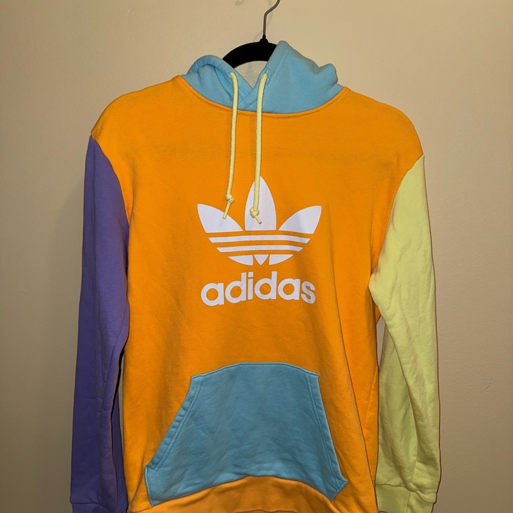Vibrant Adidas hoodie with a multicolor design